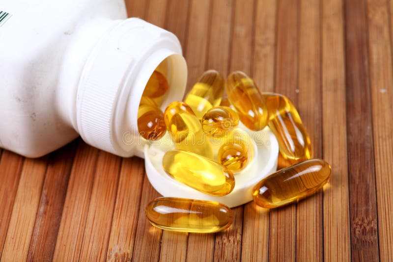 Fish oil capsules stock image. Image of clear, health 31887539