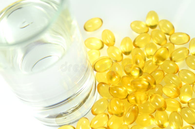 Fish Oil Capsules and Glass of Water Stock Image Image of capsule, nature 35411509