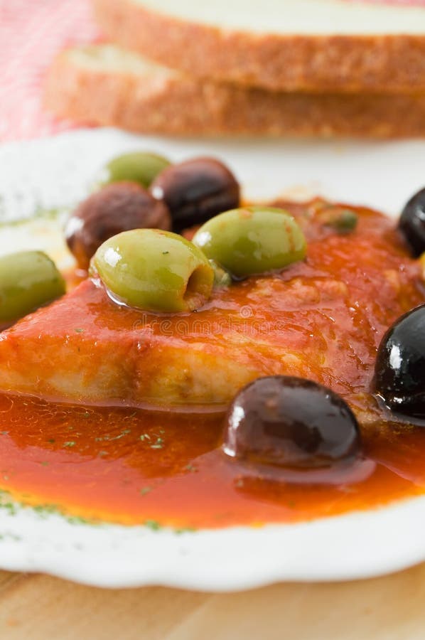 Fish with Olives in Tomato Sauce. Stock Image Image of fish, capers