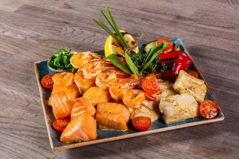 Fish and prawn plate stock image. Image of salad, restaurant 120590311