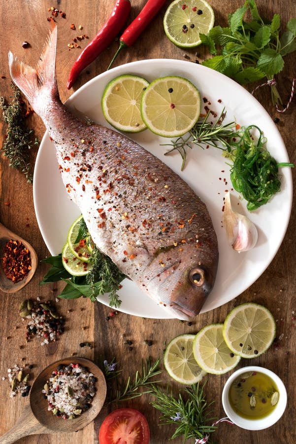 Fish Raw with Spices and Herbs Stock Photo Image of olive, kitchen