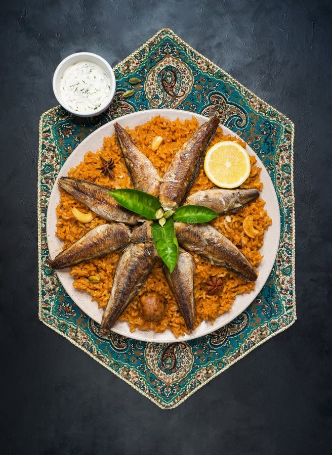 Fish with a Rice Side Dish. Arab Fish Kabsa Stock Image - Image of