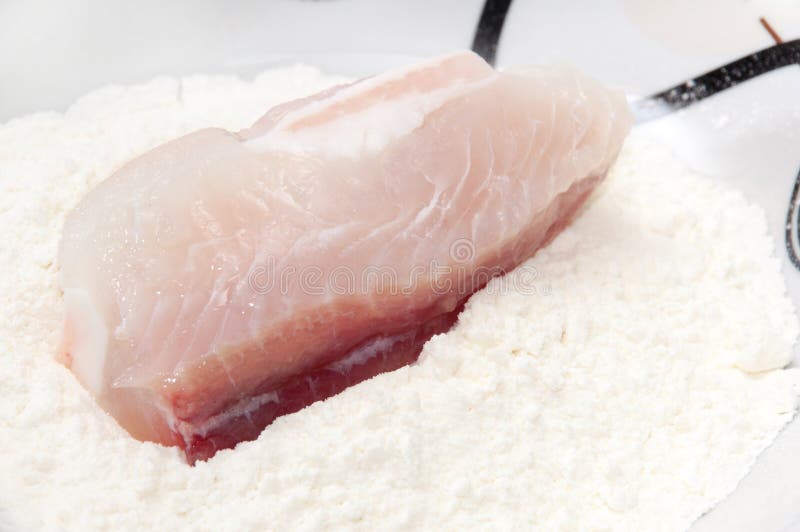 The Fish Rolled In Flour And Prepared For Frying Stock Photo Image of