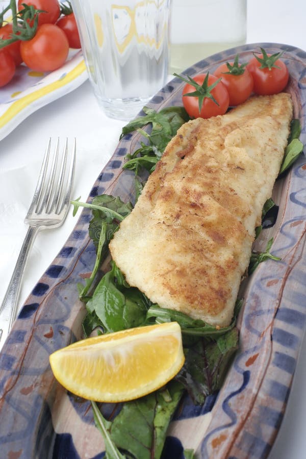 Fish And Salad On Earthenware Platters; Water Glass Picture. Image 1239530