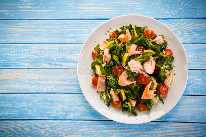 Fish salad - grilled salmon and vegetables royalty free stock photo Fish salad - grilled salmon and vegetables royalty free stock photo