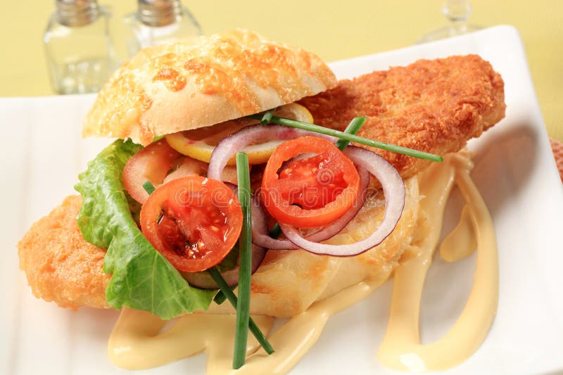 Fish sandwich stock image. Image of fillet, onion, fresh 19944599