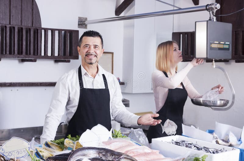 Fish sellers stock image. Image of mature, market, girl 65936209