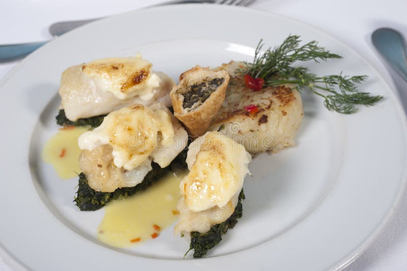Fish and spinach a la carte meal