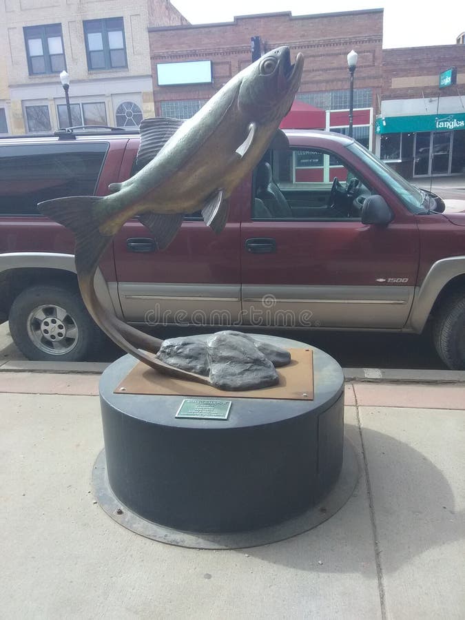 Fish statue in Sheridan editorial stock image. Image of green 175414839