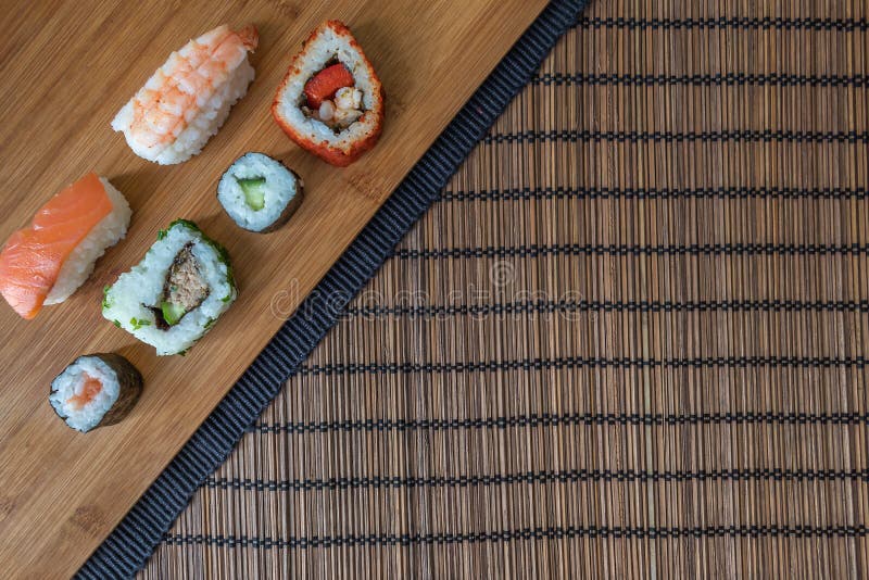 Fish Sushi on Bamboo Board and Mat Stock Photo Image of sushi, line