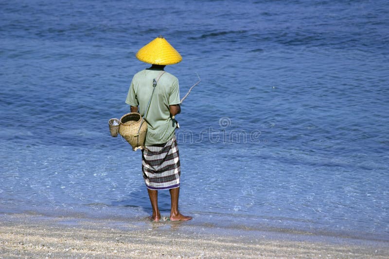 Fisherman on the beach