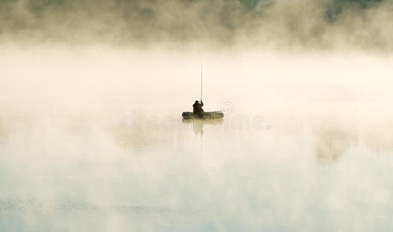 The Fisherman by the Boat in Fog Stock Photo - Image of river, mystic ...