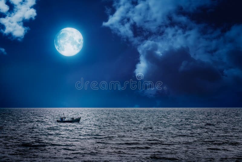 Fisherman boat sailing at night