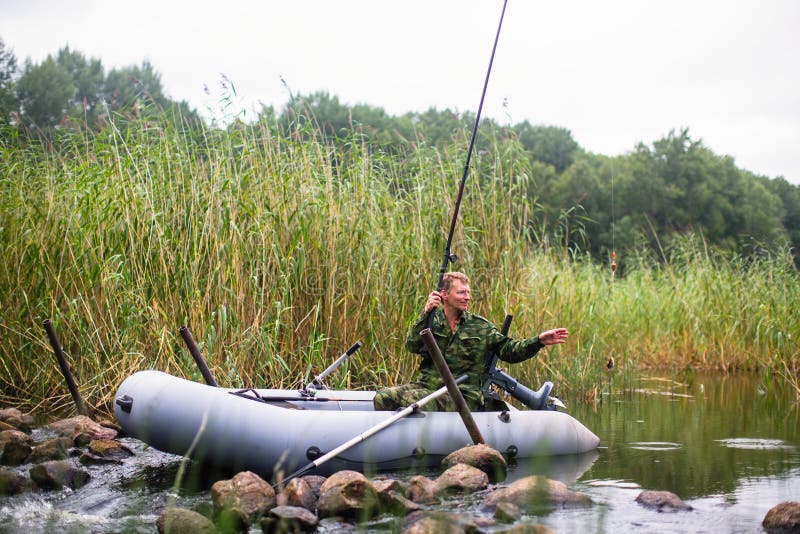Fisherman Catching Fish on the River from Rubber Boat. Nature. Stock Image Image of leisure