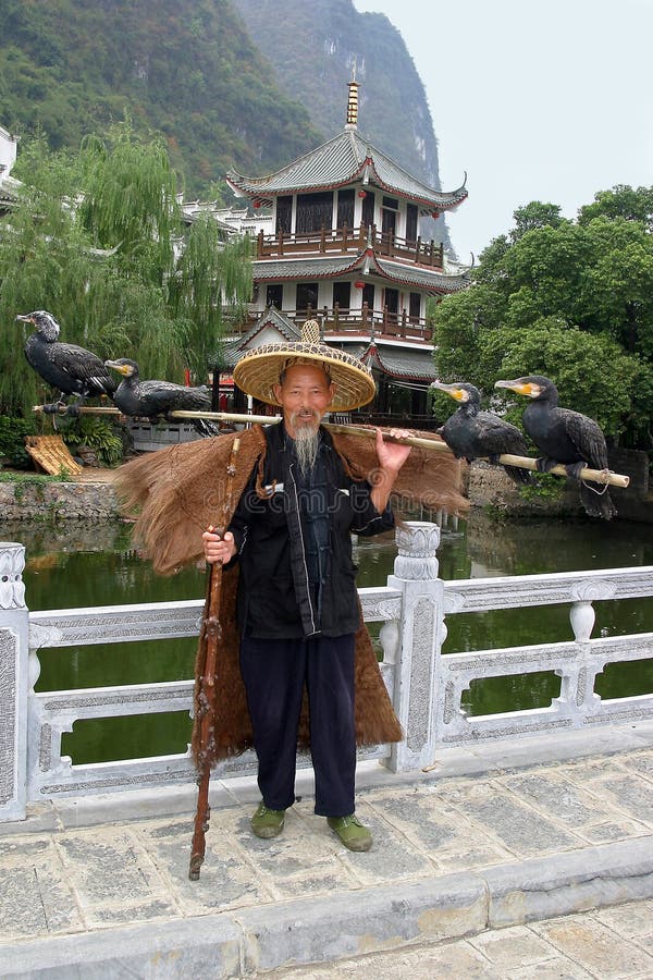 Fisherman with cormorants royalty free stock images Fisherman with cormorants royalty free stock images