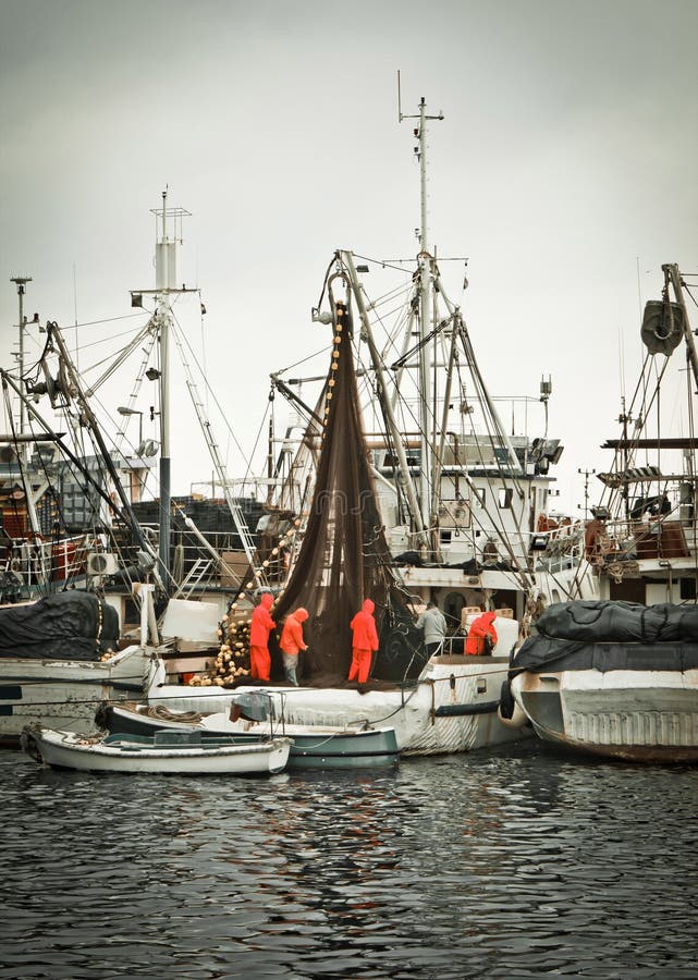 Fisherman Crew Fixing Nets on Fishing Boat Stock Photo Image of