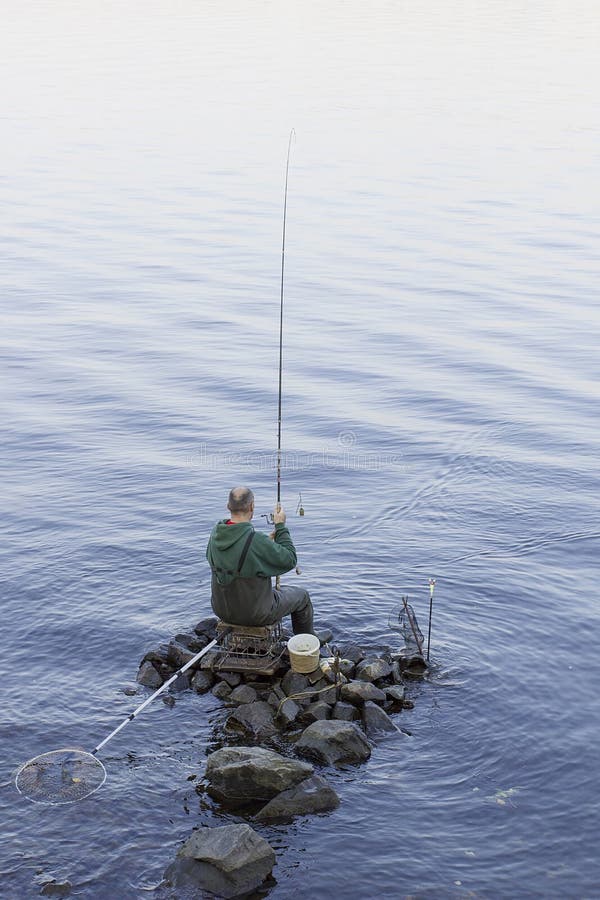 Fisherman with a fishing rod