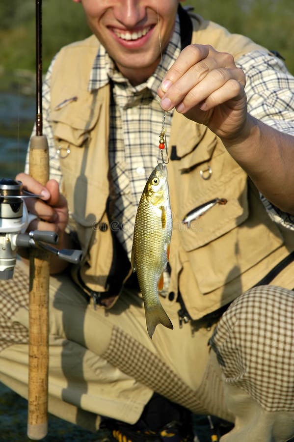 Fisherman Just Caught a Fish Stock Image Image of hobby, luck 4703177