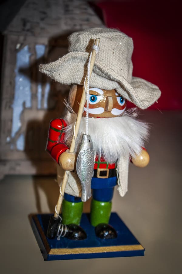 Fisherman Nutcracker With Fish On Pole And Linen Hat With Blurred