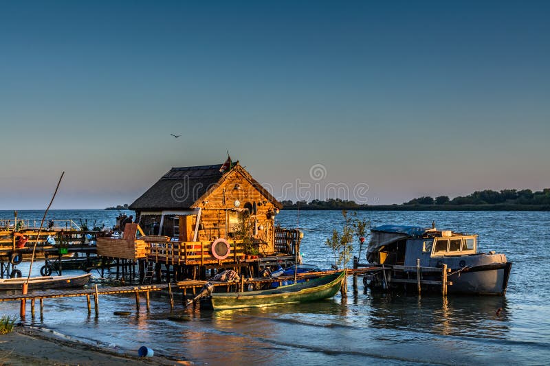 Fisherman S House, The Old Dock And The Boat On The Lake ...