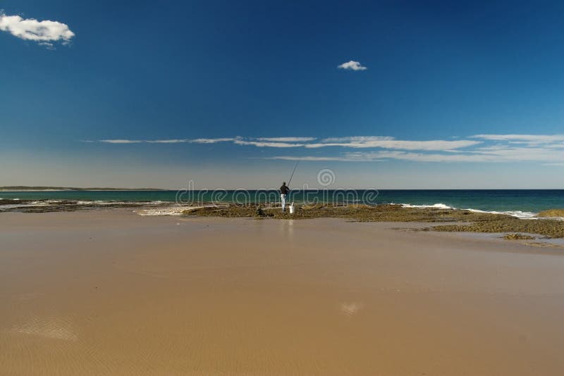 Fisherman on the shore