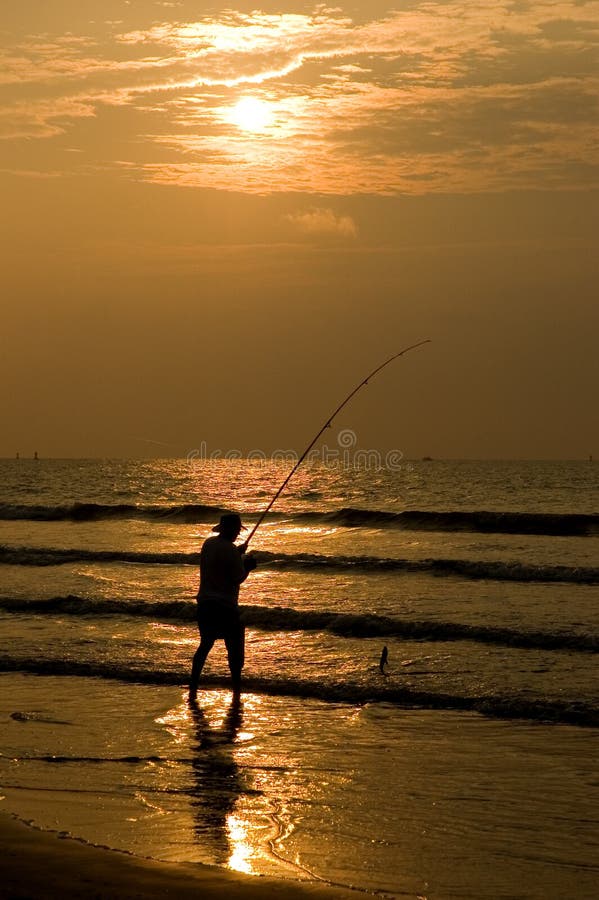 Fisherman Silhouettte in Beach Sunrise