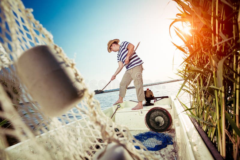 Fisherman taking out the fishing net royalty free stock photography Fisherman taking out the fishing net royalty free stock photography
