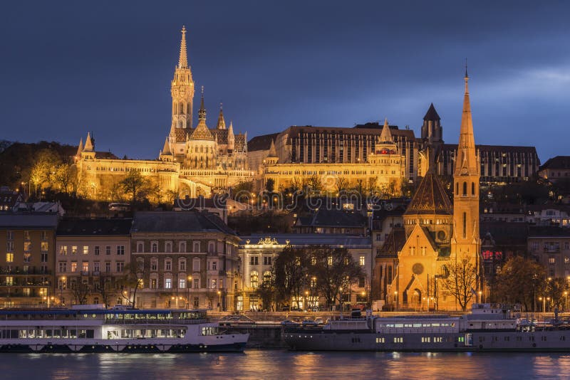 Fishermans bastion and szilágyi dezso square reformed church at dusk, Budapest, Hungary stock image Fishermans bastion and szilágyi dezso square reformed church at dusk, Budapest, Hungary stock image