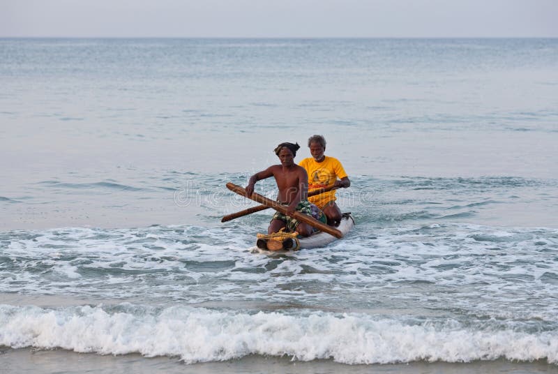 Fishermans in the traditional wooden boat