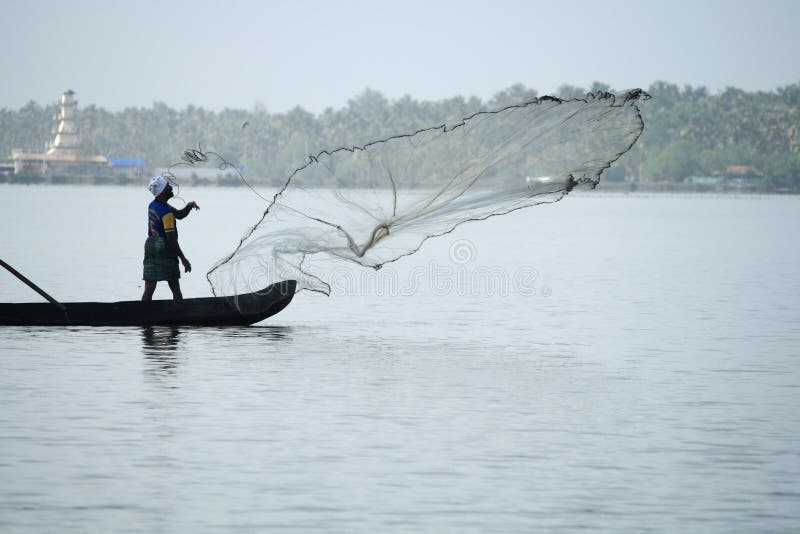 Fishermen in a Boat Catch Fish by Throwing Net in To the Backwaters  Editorial Stock Photo - Image of asia, resources: 59250128