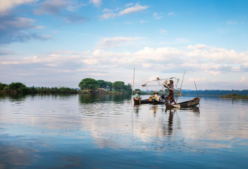 Fishermen catch fish editorial photography. Image of catching 37974612