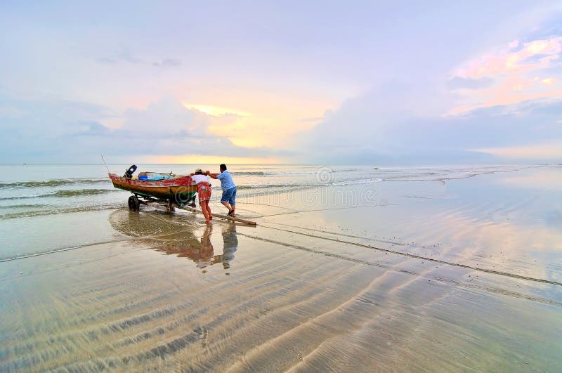 Fishermen ready to go to the sea at the morning.