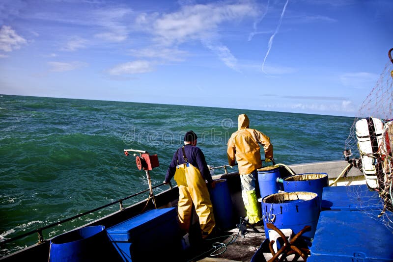 Fishermen in rough sea