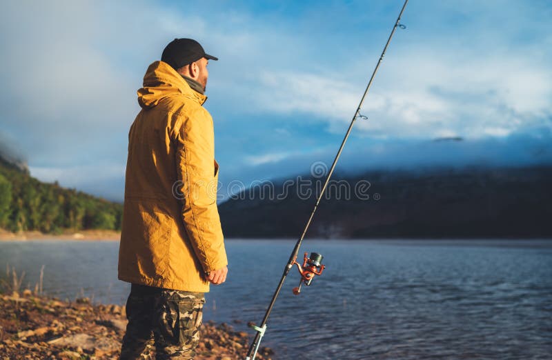https://thumbs.dreamstime.com/b/fishery-concept-fisherman-enjoy-hobby-sport-fishing-rod-evening-lake-person-catch-fish-background-blue-sky-holiday-173719521.jpg