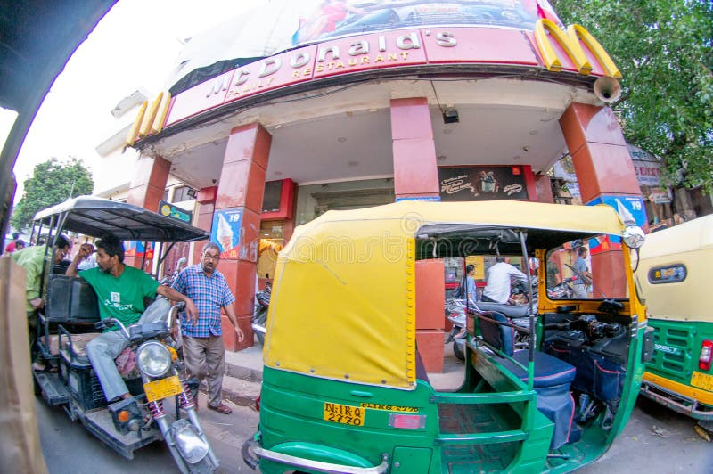 fisheye shot of chandni chowk with auto and electric rickshaw and fast food joint royalty free stock image fisheye shot of chandni chowk with auto and electric rickshaw and fast food joint royalty free stock image