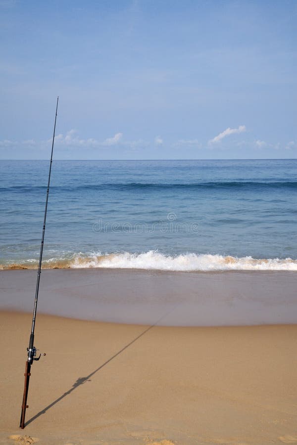 Fishing Rod Is Left On The Rock At The Marina Beach Semarang. Indonesia.  Stock Photo, Picture and Royalty Free Image. Image 197299928.