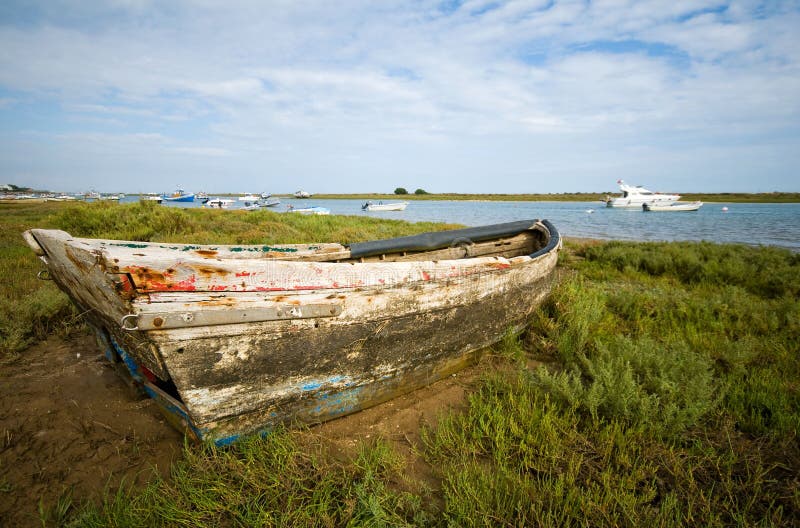 Fishing boat on beach royalty free stock photos