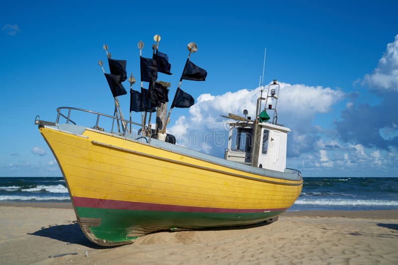 Fishing boat on the beach of the Baltic coast