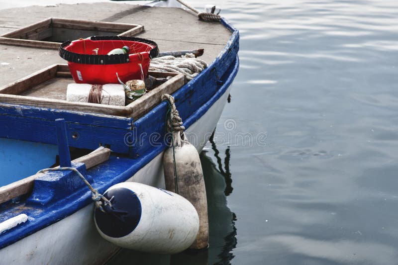 Fishing boat with fenders stock photo. Image of white 26170160