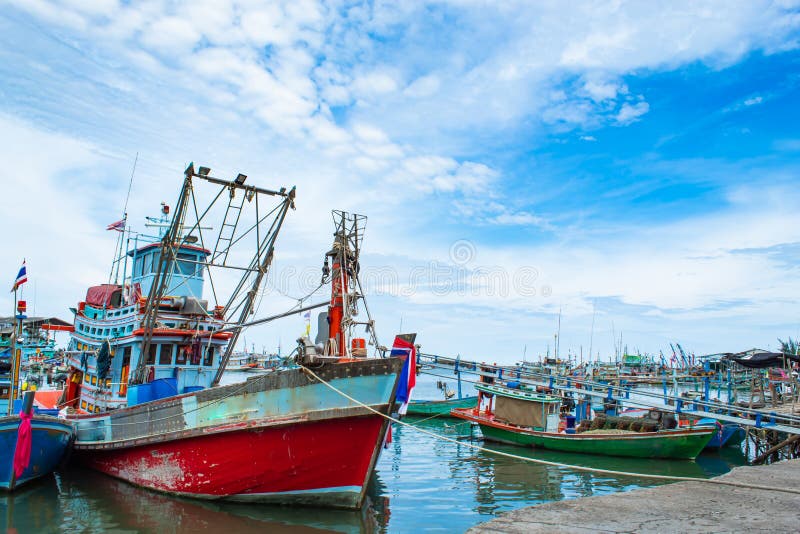 The fishing boat moored in the river access to the sea. The fishing boat moored in the river access to the sea , Thailand stock photography The fishing boat moored in the river access to the sea. The fishing boat moored in the river access to the sea , Thailand stock photography