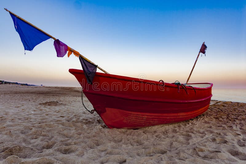 Fishing boat at sunrise.