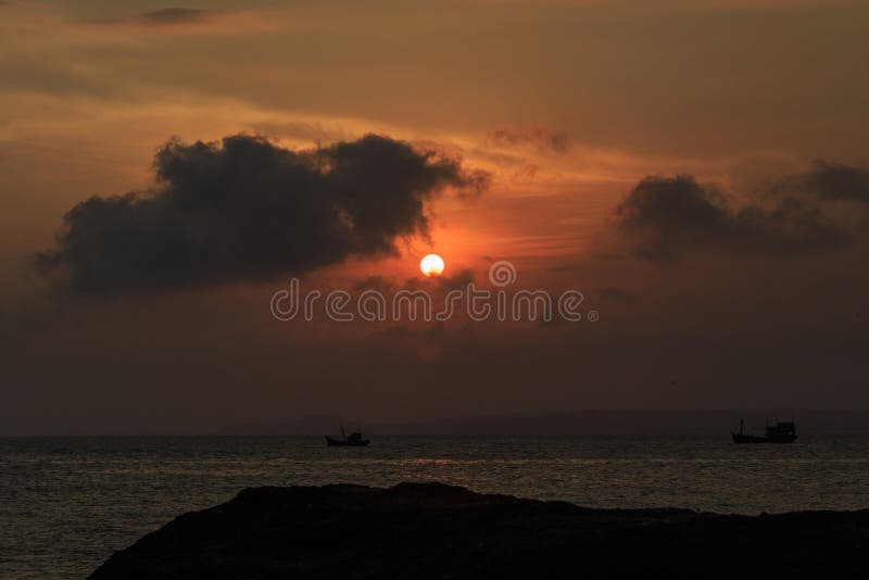 Vietnamese fishing boats in Mui Ne to the sea at sunset. Vietnamese fishing boats in Mui Ne to the sea at sunset