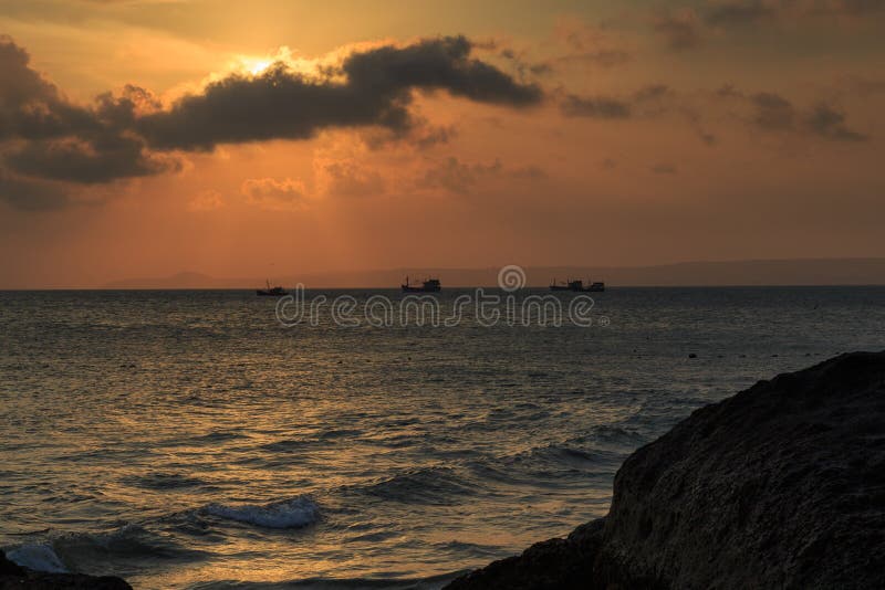 Vietnamese fishing boats in Mui Ne to the sea at sunset. Vietnamese fishing boats in Mui Ne to the sea at sunset