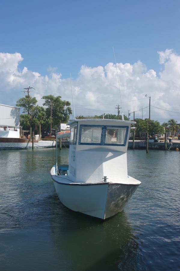 Fishing boat on water stock photo. Image of sunny, water 328270