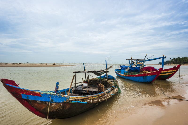 The fishing boats anchored near the seaside