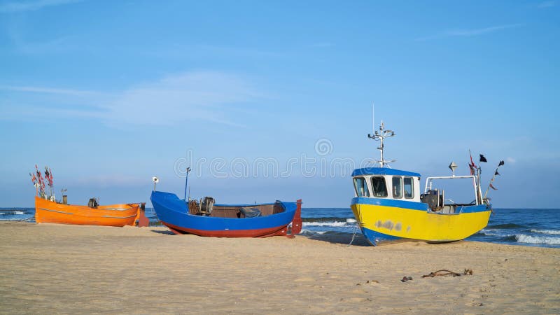 Fishing boats on the beach of Rewal in Poland