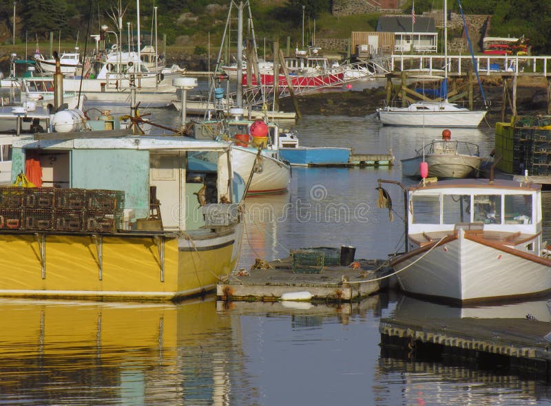 Fishing boats in harbor stock photography