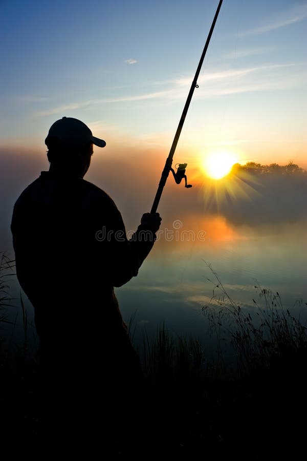 Fishing in the early morning stock photo Fishing in the early morning stock photo
