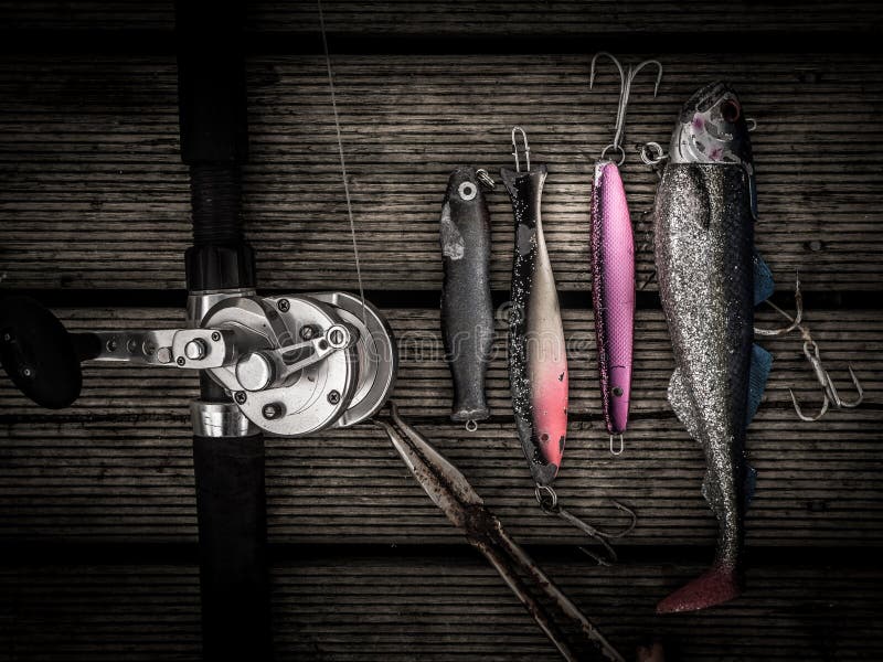 Group empty fishing hooks on fishing line Stock Photo by ©alexlmx 76591279