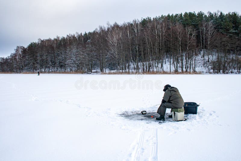 Fishing on a Frozen Lake in Winter Stock Photo Image of fishing